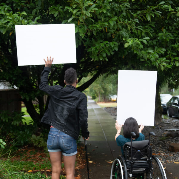 Two people protesting